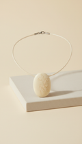 synthetic ivory pendant necklace